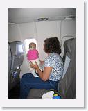 BabiesOnPlane3 * Alice has a look out the window on her first plane ride
