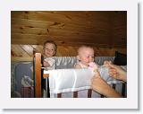 BoathouseCribFun3 * Stephen and Alice enjoy playing in the crib while the adults install a curtain in the boathouse.